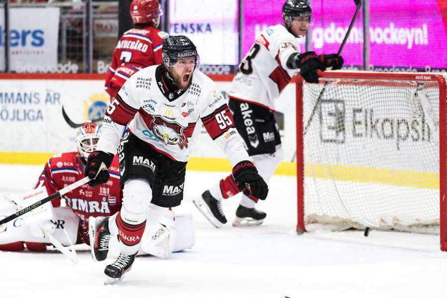 Carl Persson celebrates his last-minute winner for Malmo