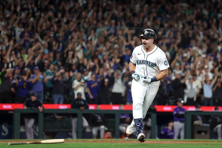 Seattle Mariners' Cal Raleigh celebrates his 60th home run