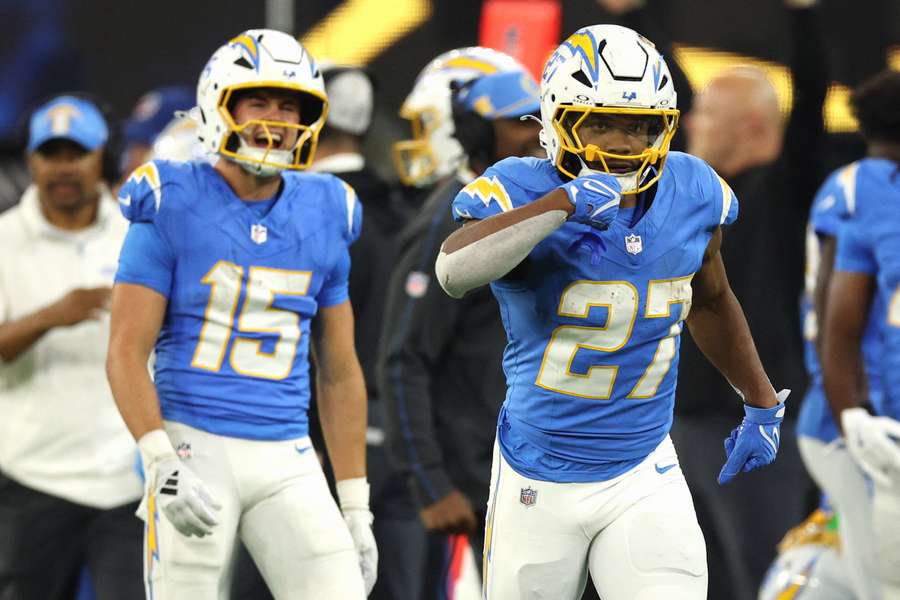 Los Angeles Chargers running back J.K. Dobbins celebrating after a touchdown against the Bengals