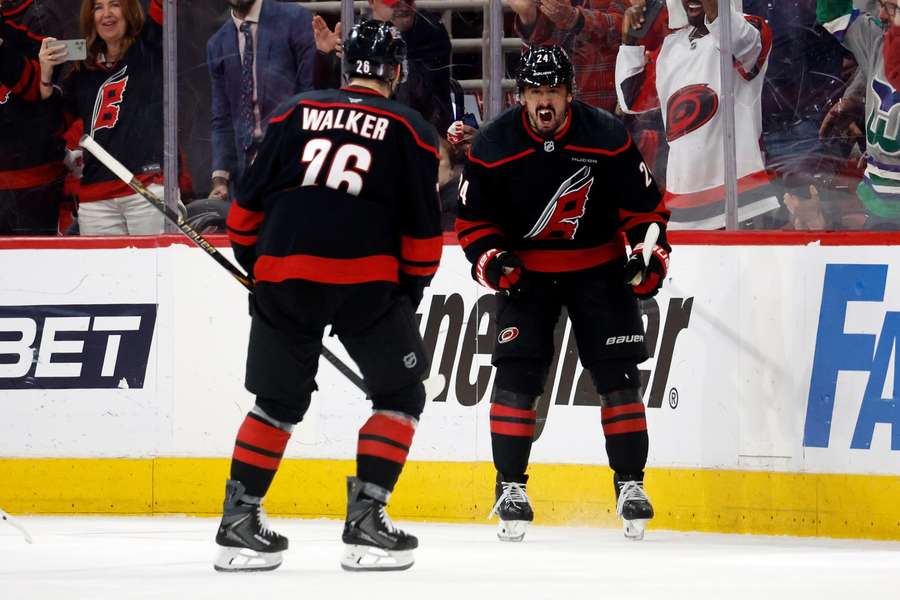Seth Jarvis and Sean Walker celebrate goal in Game 2 against Philadelphia Flyers