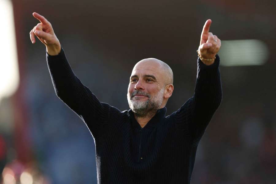 Guardiola celebrates after the match