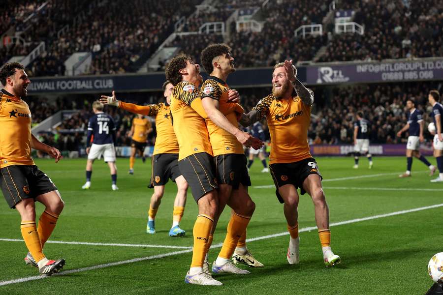 Hull players celebrate vital goal Hull players celebrate vital goal