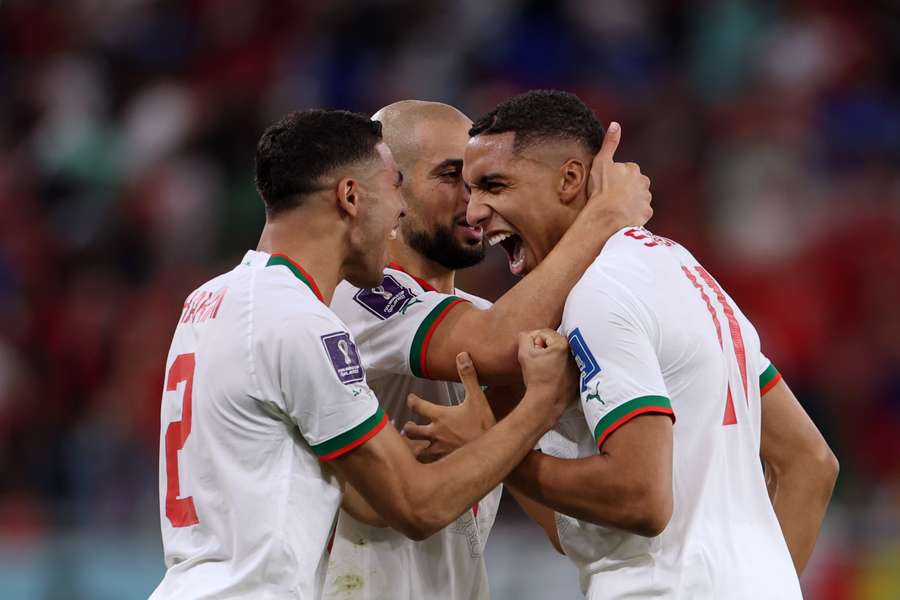 Morocco players celebrate against Belgium 