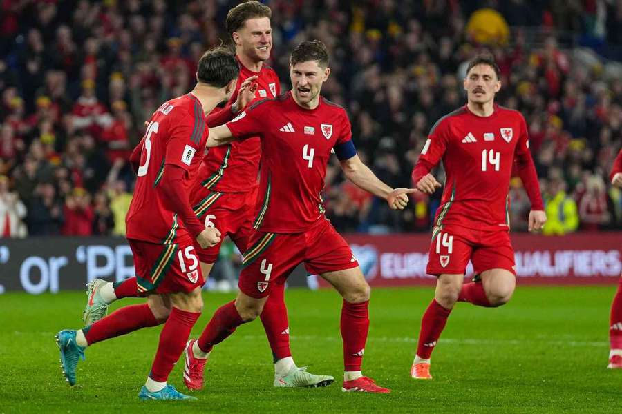 Ben Davies of Wales celebrates scoring his team's second goal 