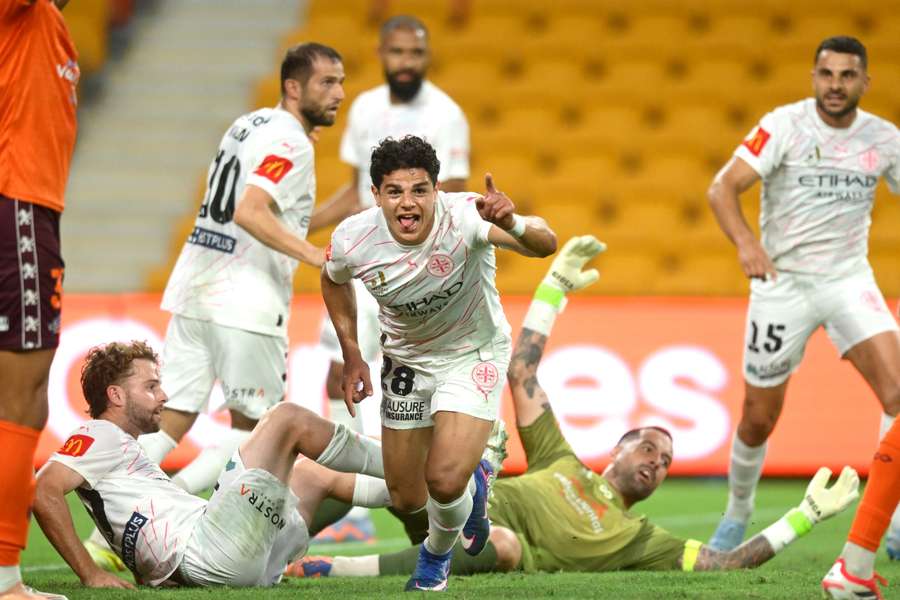 Melbourne City midfielder Marcus Younis wheels away in celebration after scoring.
