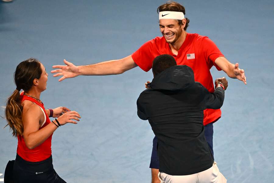 Fritz celebrates with Tiafoe and Pegula after their win