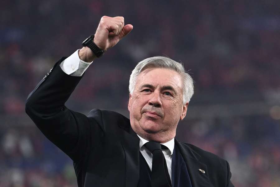 Real Madrid's Italian coach Carlo Ancelotti gestures as he celebrates his team's victory during the UEFA Champions League final in May 2022