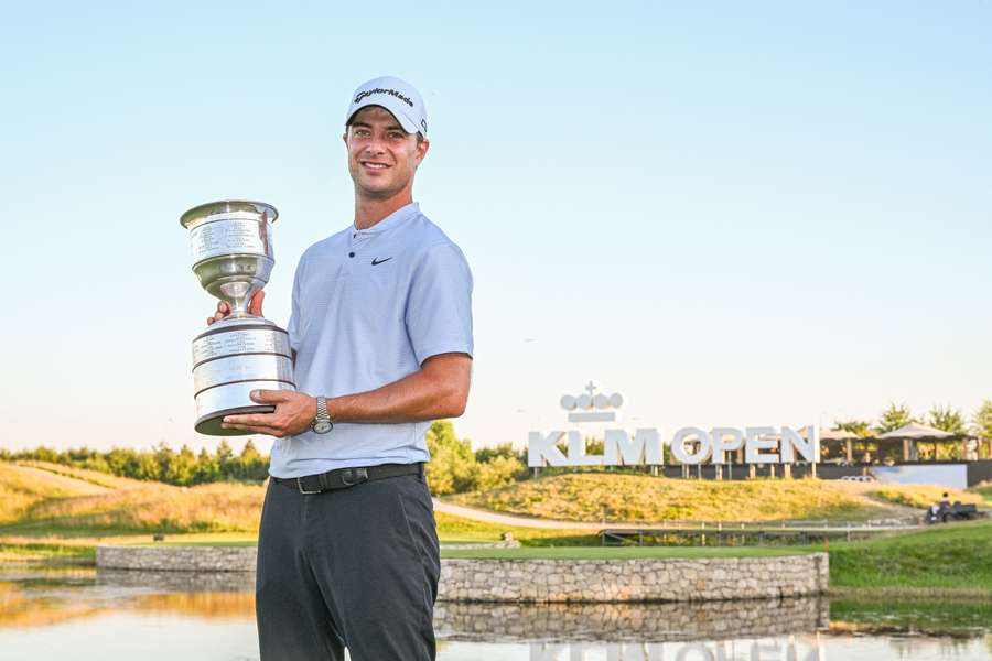 Migliozzi poses with his trophy