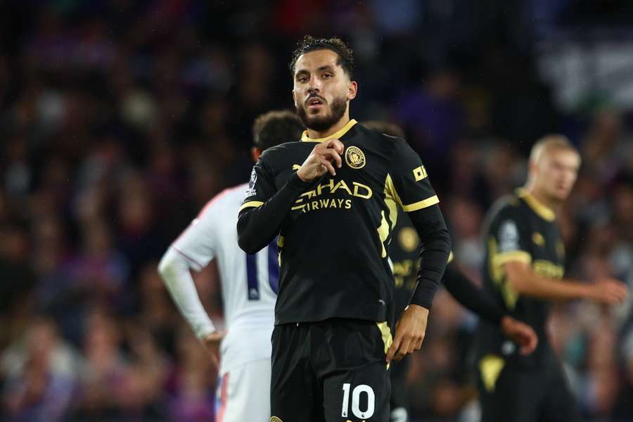 Cherki celebrates scoring
