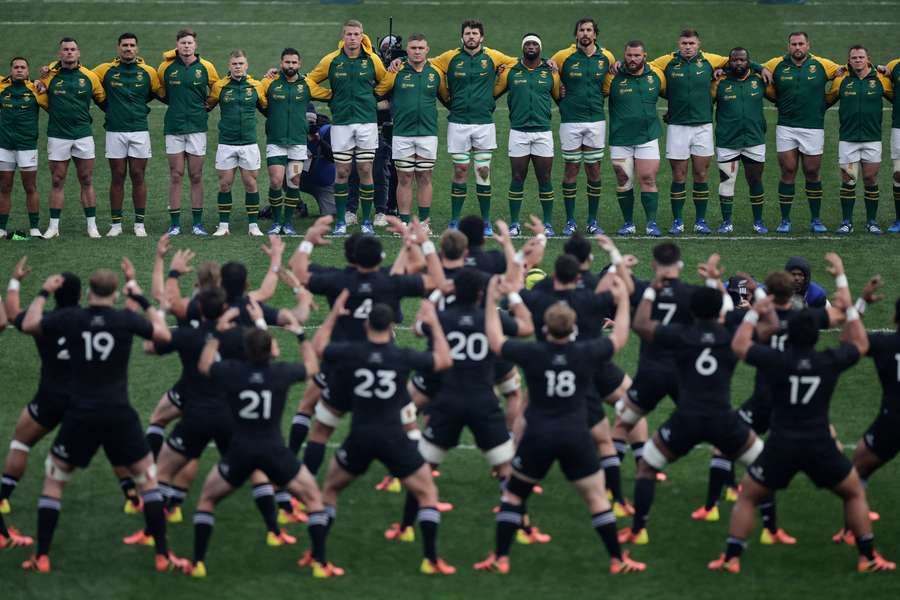 All Blacks players performing a haka in front of the Springboks in Johannesburg. All Blacks players performing a haka in front of the Springboks in Johannesburg.