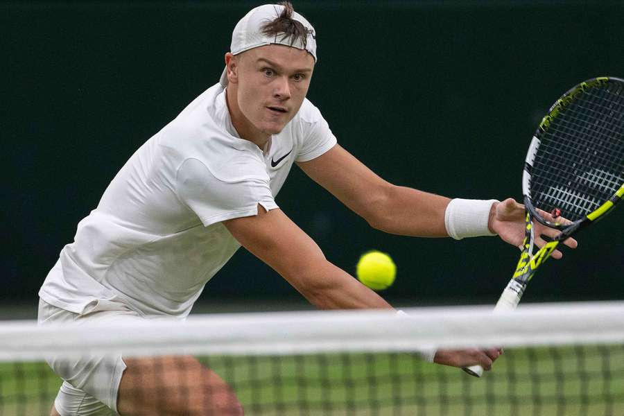 Holger Rune in Wimbledon action