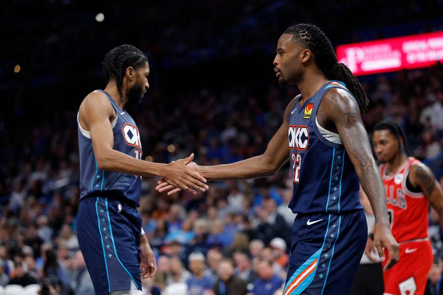 Oklahoma City Thunder guard Isaiah Joe and guard Cason Wallace celebrate after a basket against the Chicago Bulls