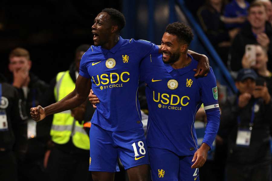 Welbeck celebrates with James