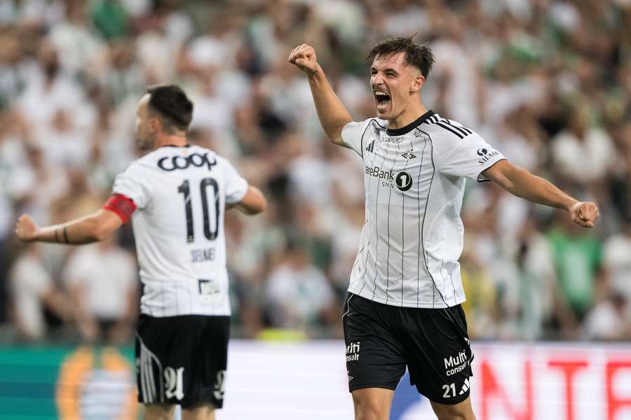 Rosenborg players celebrate victory at full-time