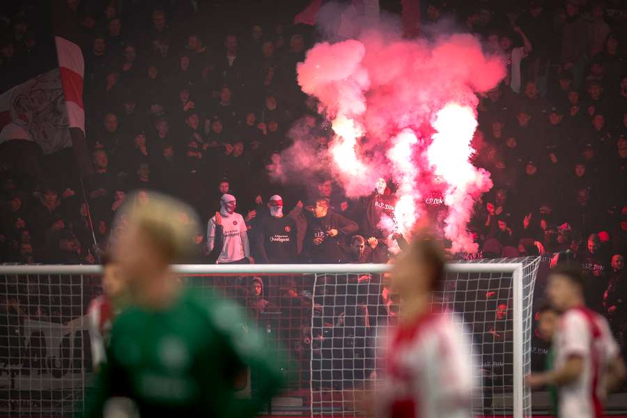 The game between Ajax and FC Groningen was abandoned after fireworks were set off