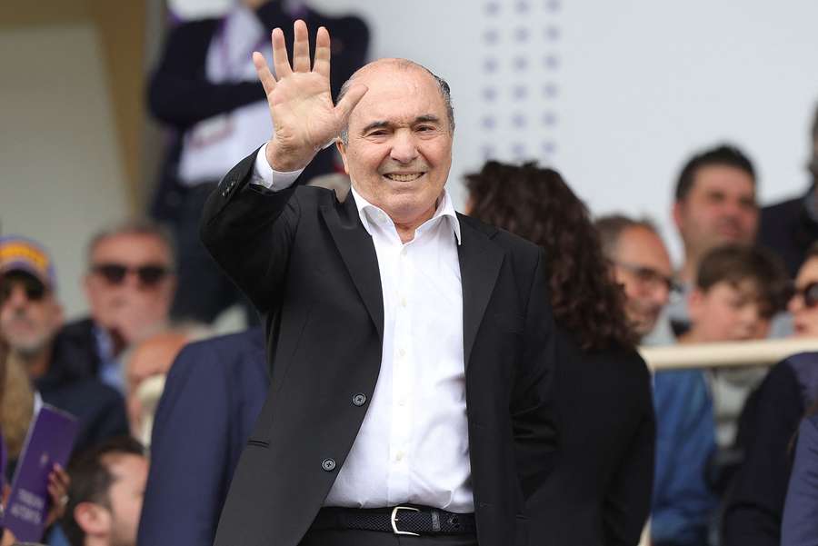 Rocco Commisso waves to the Fiorentina fans during one of the club's home matches.