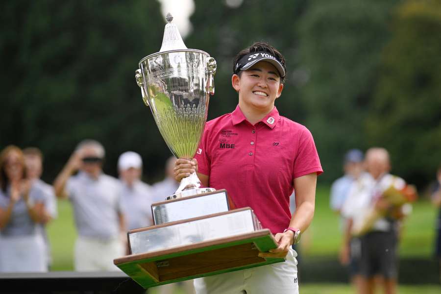 Akie Iwai poses with the trophy after winning 2025 Portland Classic