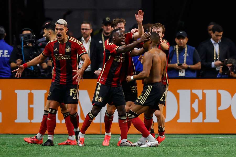 Xande Silva (shirtless) and his teammates go crazy after Atlanta United upsets Inter Miami in game two matchup of MLS playoffs