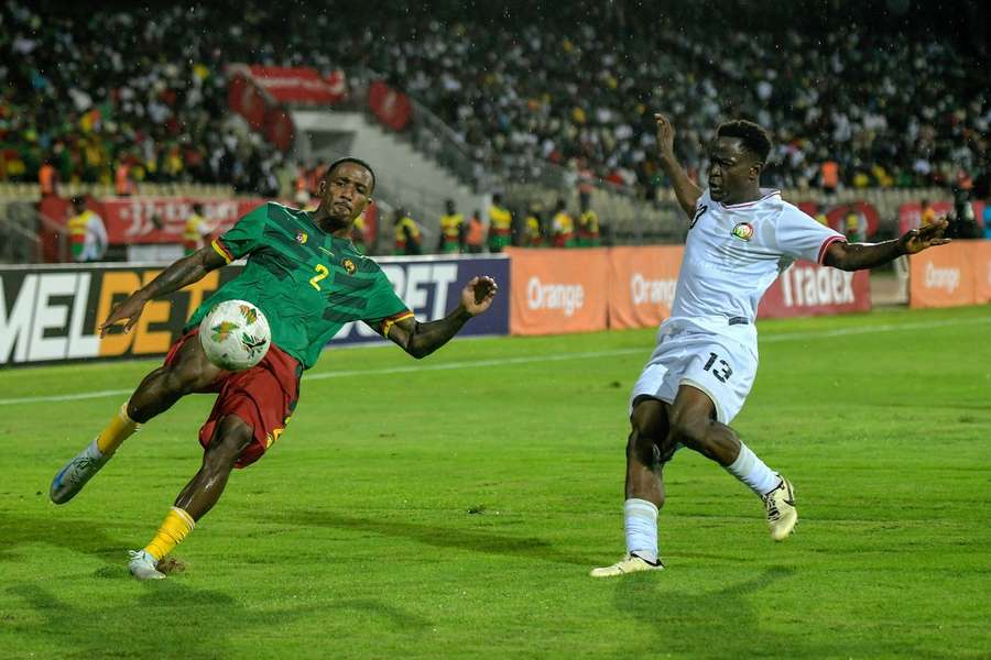 Jackson Tchatchoua of Cameroon and Erick Ouma of Kenya during their 2025 AFCON qualifier