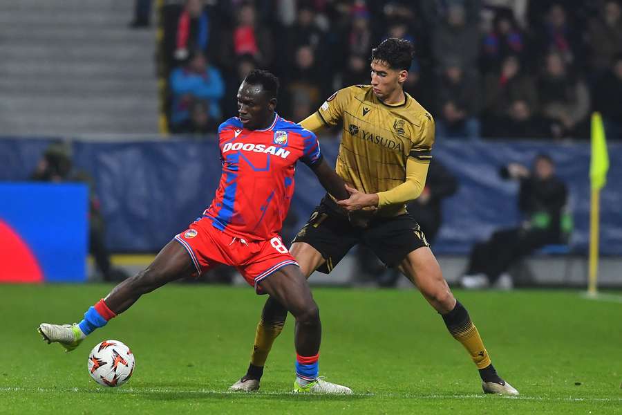 Prince Kwabena Abu battles and Real Sociedad's Moroccan defender Naif Aguerd for the ball