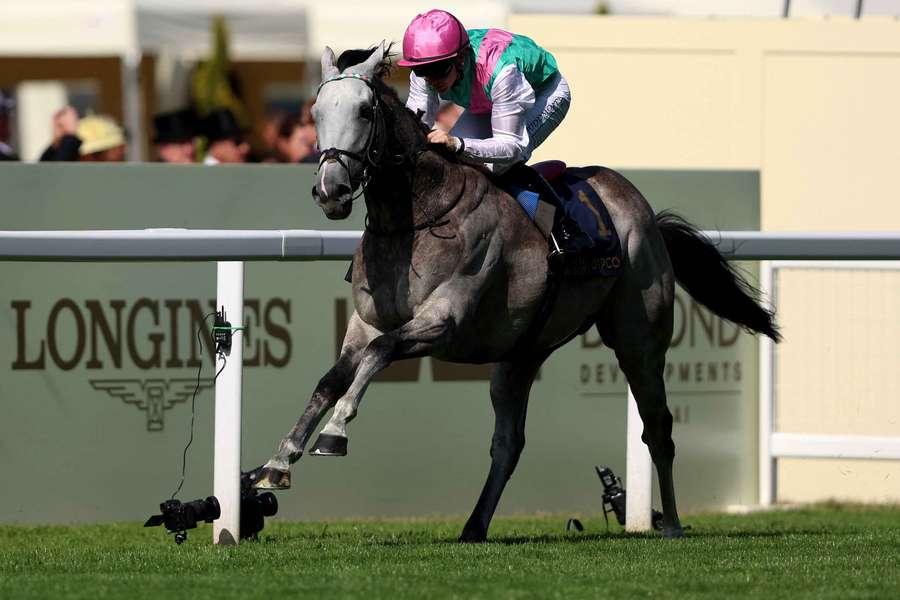 Colin Keane riding Field Of Gold during The St James's Palace Stakes on day one