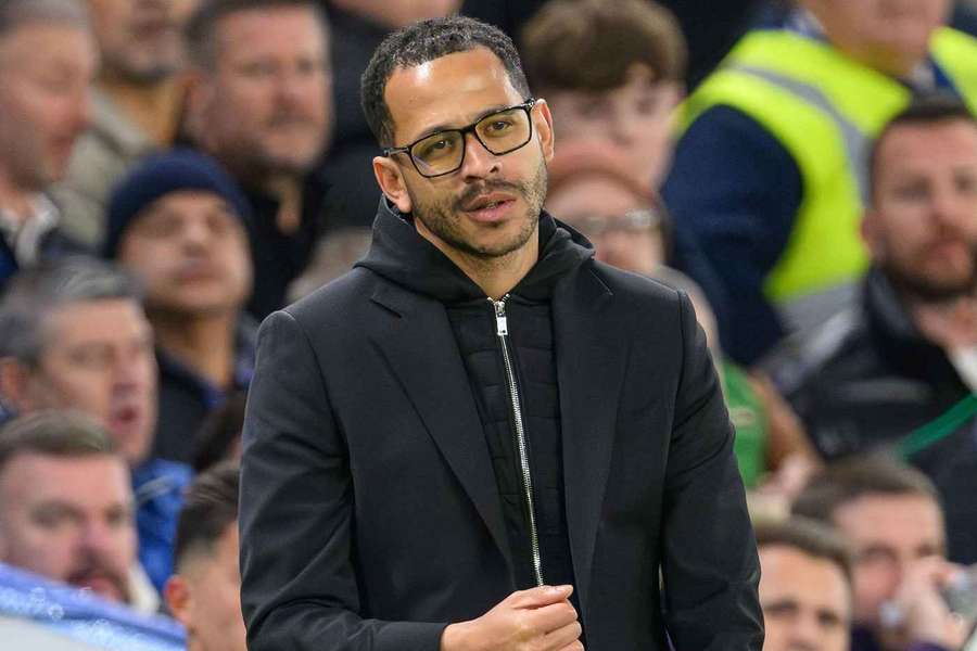 Liam Rosenior looks on during Chelsea's defeat to Man Utd