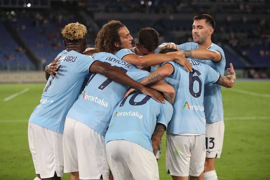 Lazio celebrate their equaliser in Rome