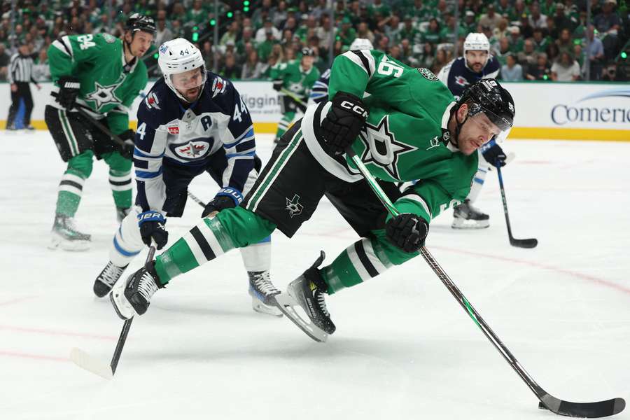 Stars forward Mikko Rantanen handling the puck during Game 3 vs. Winnipeg Jets (2025 Stanley Cup Playoffs)