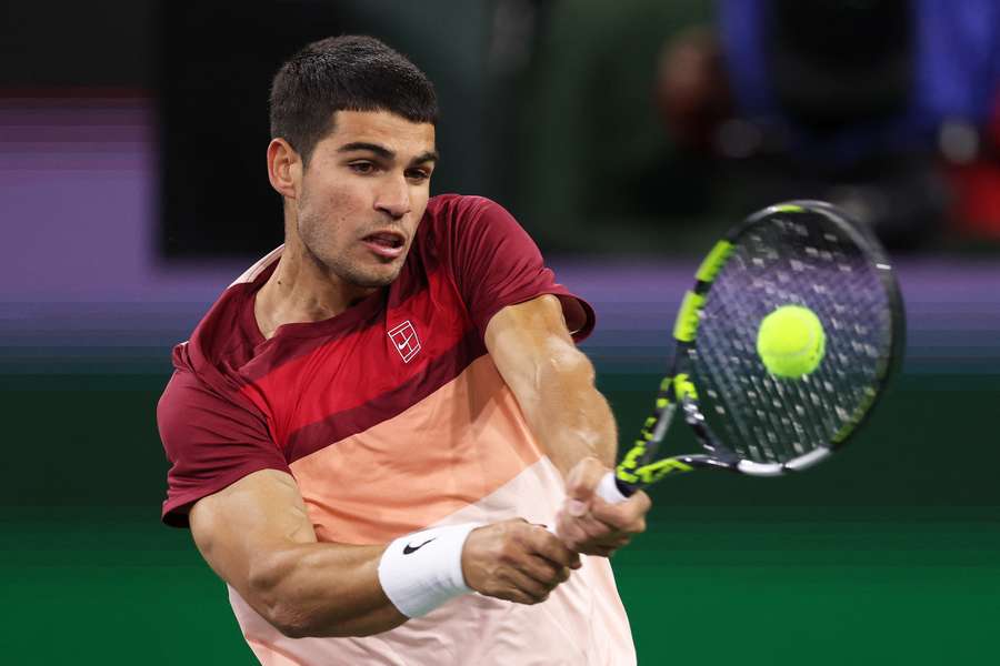 Two-time defending champion Carlos Alcaraz plays a forehand volley on the way to a quarter-final victory over Francisco Cerundolo at Indian Wells