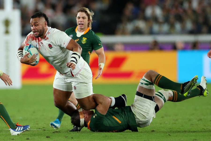 Billy Vunipola is tackled by Francois Louw during the Rugby World Cup 2019 Final between England and South Africa in 2019