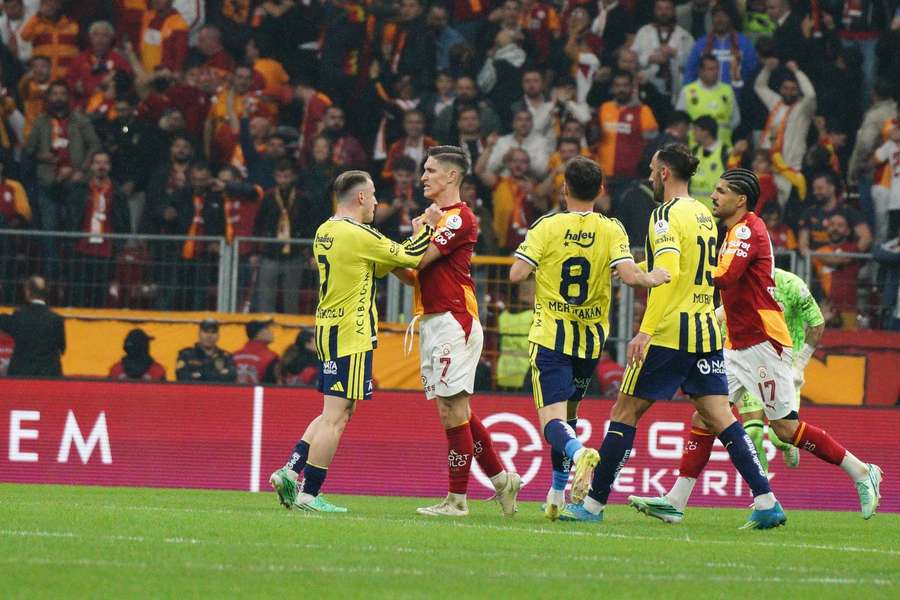 Fenerbahce's Kerem Akturkoglu and Galatasaray's Roland Sallai kickstarted the brawl Fenerbahce's Kerem Akturkoglu and Galatasaray's Roland Sallai kickstarted the brawl