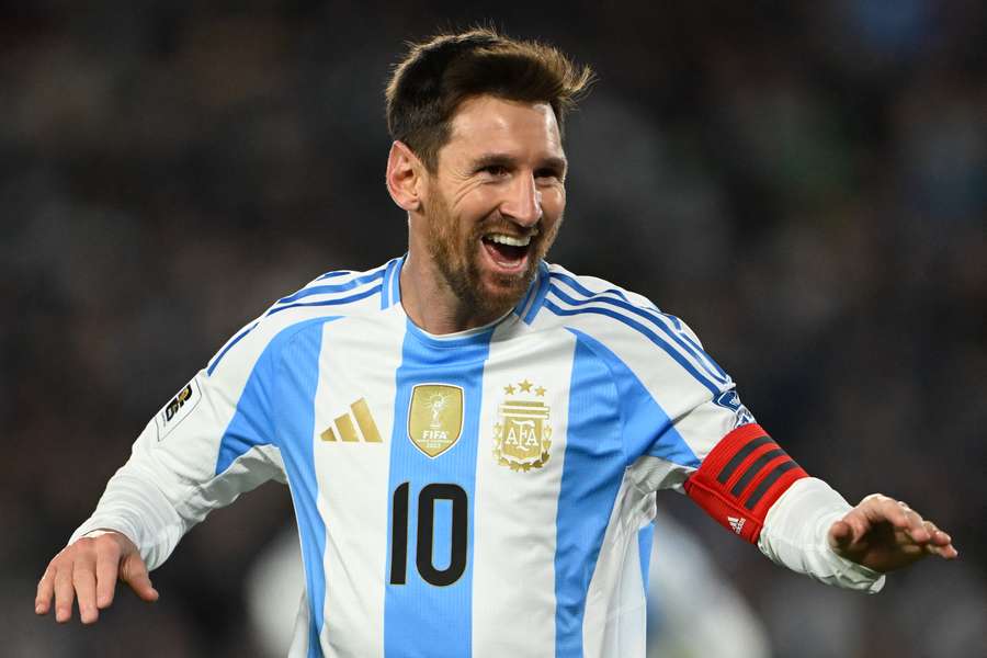 Lionel Messi celebrates after scoring his second goal during Argentina's World Cup qualifier against Venezuela last year