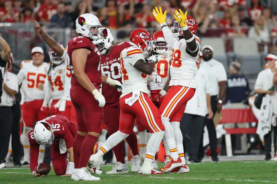 Janarius Robinson (right, #98) celebrates a sack during 2025 preseason