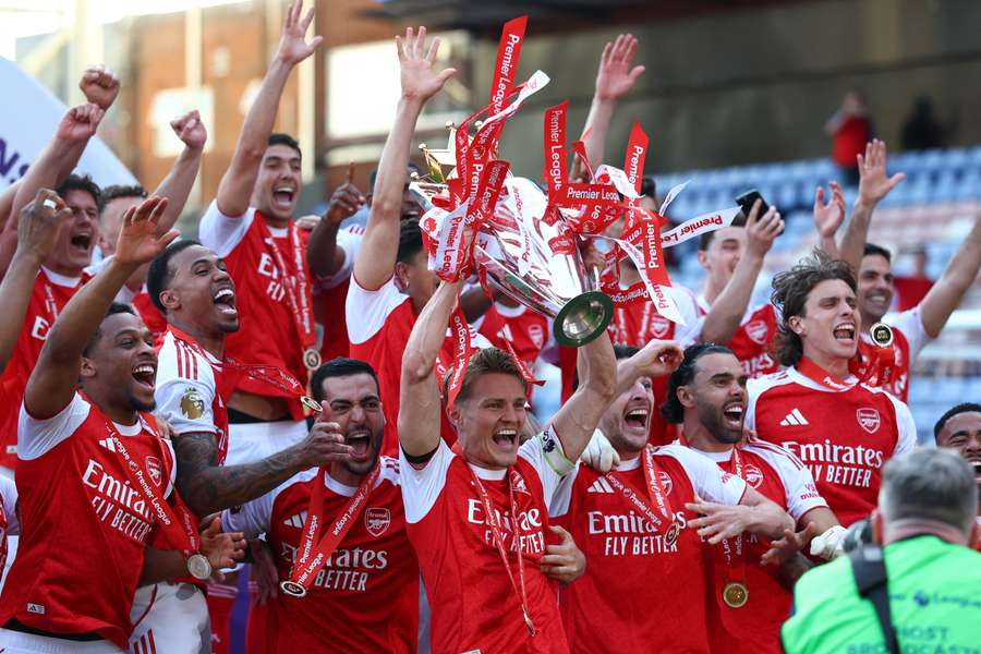 Arsenal players celebrate title