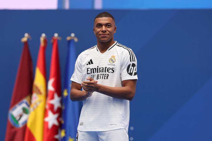 Kylian Mbappe looks on during a first appearance as a Real Madrid player