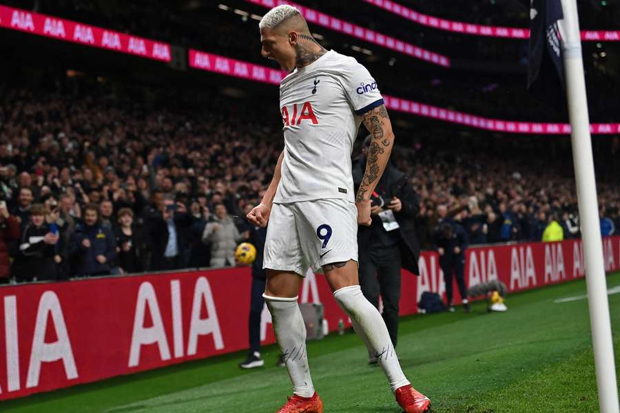 Richarlison celebrates scoring Tottenham's third