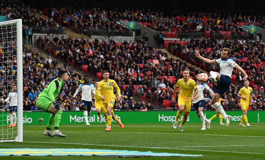 England's striker Harry Kane shoots but fails to score 