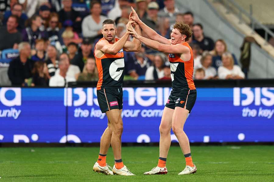 Jesse Hogan celebrates after booting one of his seven goals against Geelong at GMHBA Stadium at the weekend.