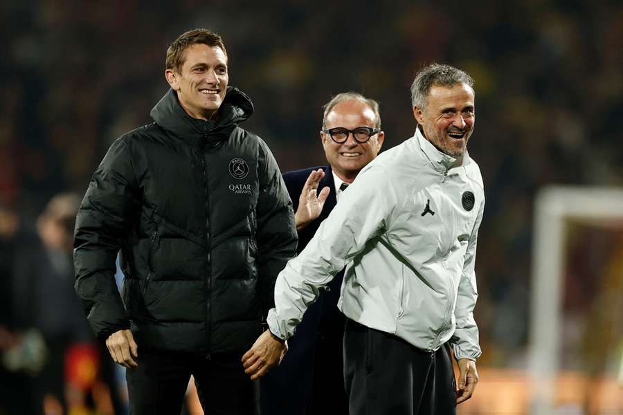 PSG coach Luis Enrique celebrates with football advisor Luis Campos after winning Ligue 1 PSG coach Luis Enrique celebrates with football advisor Luis Campos after winning Ligue 1