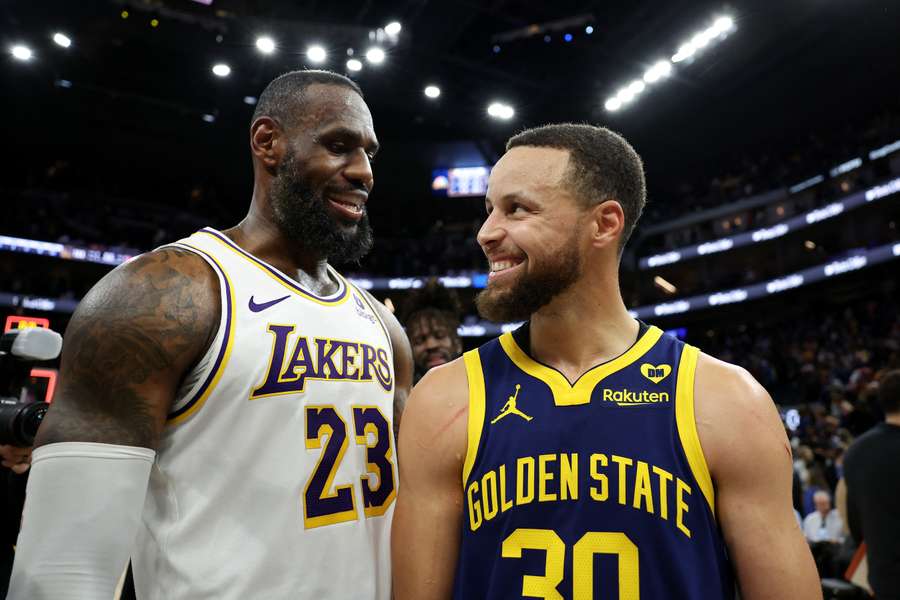 Los Angeles Lakers' LeBron James and Golden State Warriors' Stephen Curry are two of the highest-paid players in the NBA