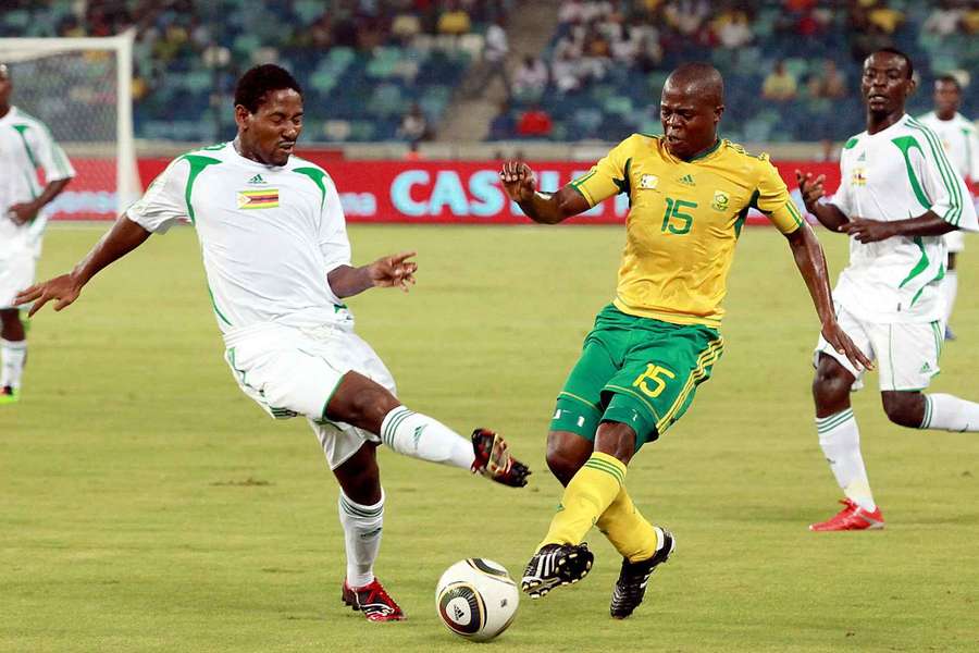 Zimbabwean defender Comore Sibanda (left) vies with Bafana Bafana central defender Lucas Twala in their 2010 clash.