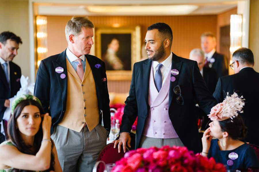 Qatar Racing manager David Redvers (L) chatting with Sheikh Fahad Al-Thani (R)