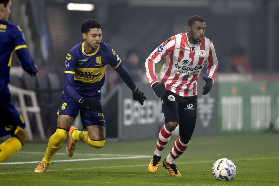 RKC's Richonell Margaret (L) battles with goalscorer Said Bakari during the Eredivisie game between RKC and Sparta