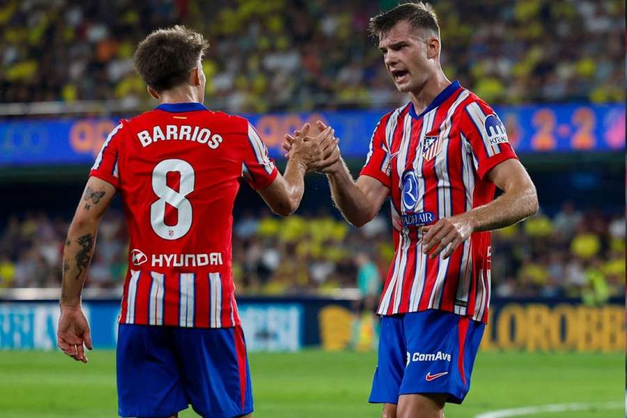 Jose Gimenez celebrates scoring