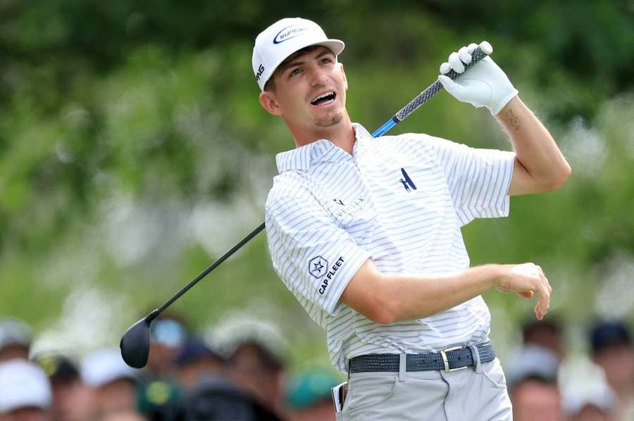 Sam Bennett reacts to his tee shot on the fourth hole