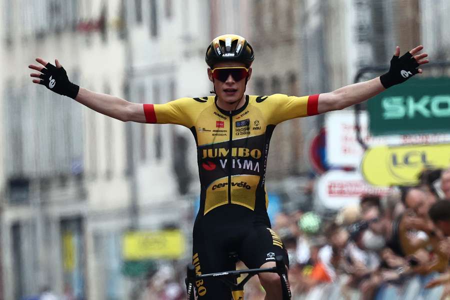 Jumbo-Visma rider Jonas Vingegaard crosses the line alone to win the fifth stage of the Criterium du Dauphine cycling race