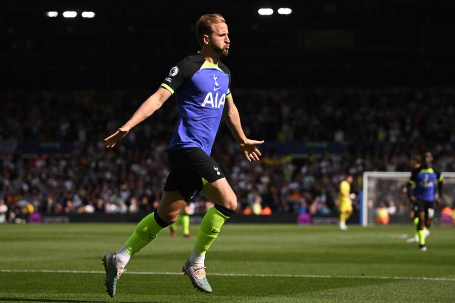 Tottenham Hotspur's English striker Harry Kane celebrates after scoring the opening goal