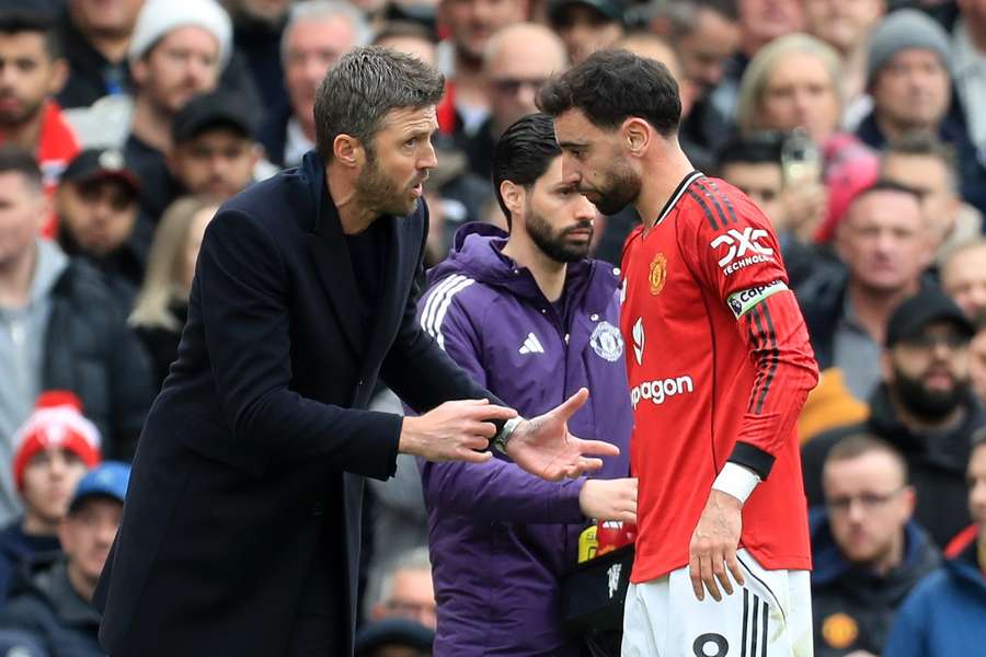 Michael Carrick com Bruno Fernandes