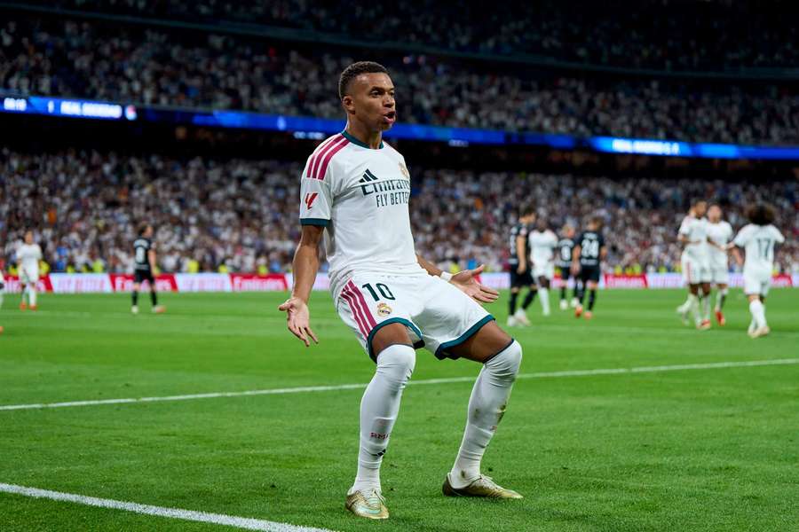 Kylian Mbappe celebrates scoring