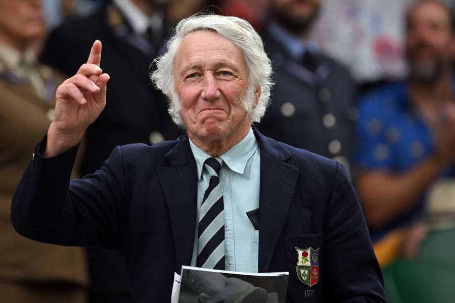 Former Welsh rugby union player JPR Williams gestures at the Centre Court's Royal Box on the sixth day of the 2023 Wimbledon 